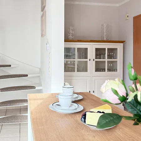 Weidenperle Nyaraló